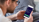 Well Case Study mit isolutions Mann schaut auf das Handy mit der offenen Well Gesundheits-App